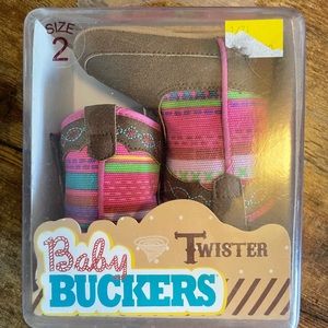 Brand new never worn Baby Buckers